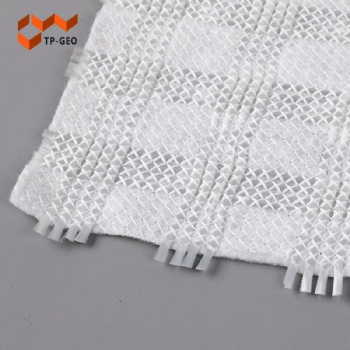 Warp knitted composite geotextile