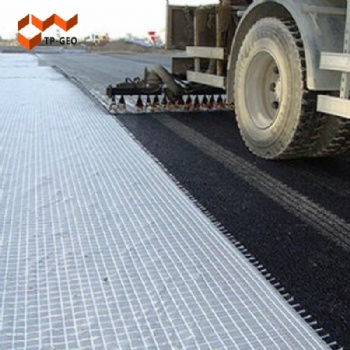 Warp knitted composite geotextile